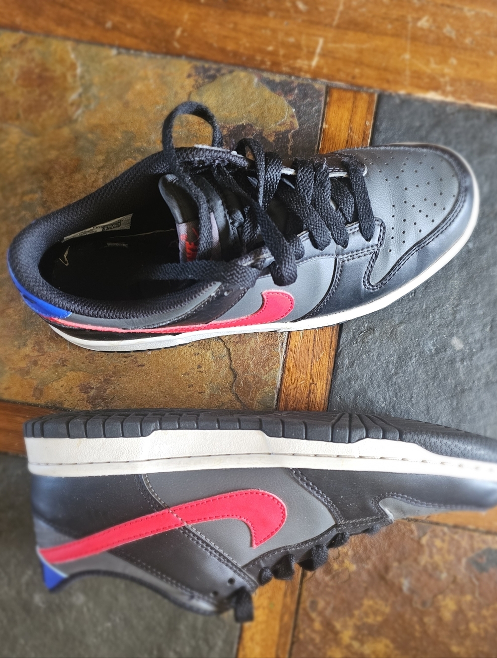 Nike Kids Black Sneakers with Pink Swoosh and Blue Heel
